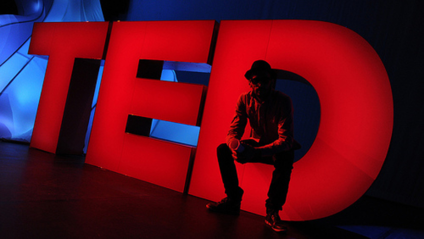 TED Prize winner JR meets the oversized onstage TED logo. Behind the scenes at TED2011, February 28 - March 4, Long Beach, CA. Credit: James Duncan Davidson / TED